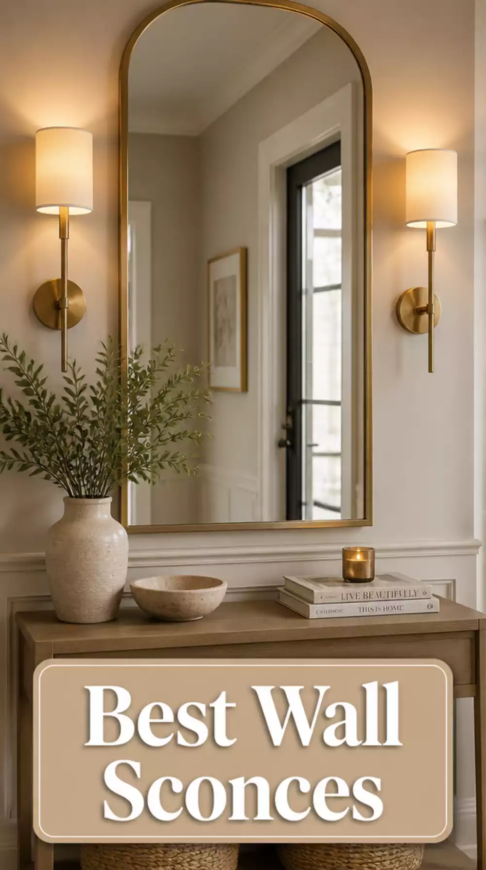 Entryway Wall Sconce in Brushed Brass That Frames a Mirror Beautifully